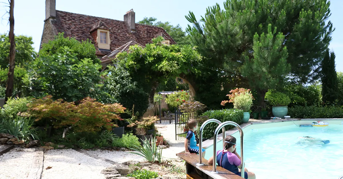 The pool at the family's house sit in Le Bugue, France